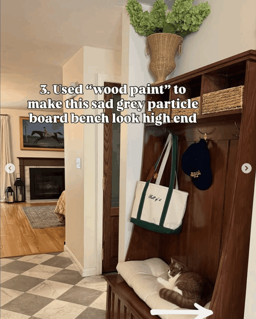 Brown entryway bench with cushion and storage baskets, painted to mimic real wood for a high-end look. Functional small entryway furniture makeover.