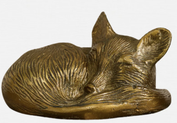 Bronze sleeping fox sculpture for fall decor.