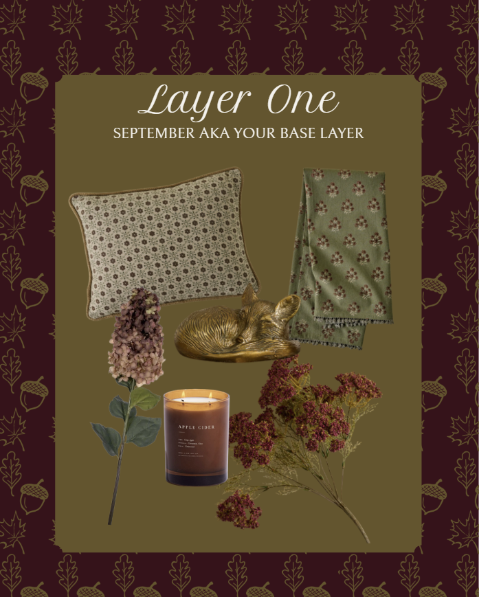 Early fall decor ideas with cozy September accents – patterned throw pillow, green floral blanket, faux hydrangeas, apple cider candle, and woodland fox figurine for a warm base layer.