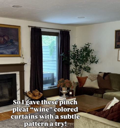 Cozy living room with wine curtains.