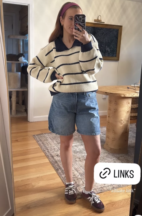 Fall teacher outfit with oversized cream and navy striped collared sweater, Bermuda denim shorts, and burgundy Adidas sneakers from Amazon.
