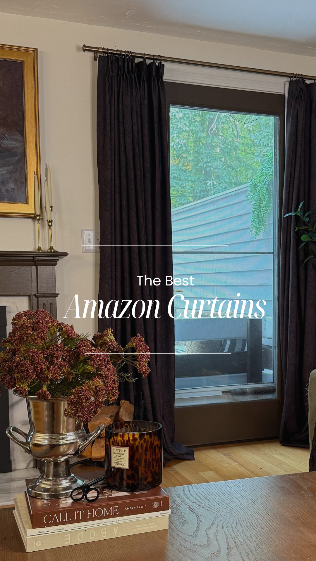 Deep burgundy curtains that are pinch pleat.
