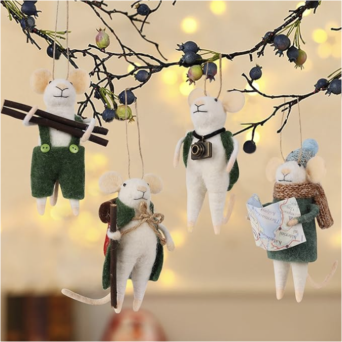 Whimsical felt Christmas mouse ornaments holding skis, books, and cameras — cozy and playful holiday decorations that add charm to a traditional or eclectic Christmas tree. Perfect for cozy home decor, cottagecore styling, and whimsical holiday decorating ideas.