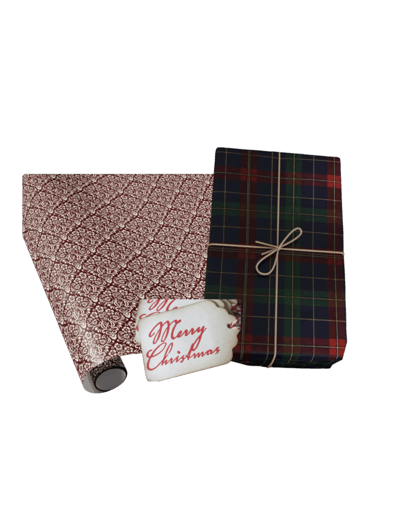 Red and white damask wrapping paper roll beside tartan plaid wrapped gift with twine bow and vintage-style “Merry Christmas” tag.