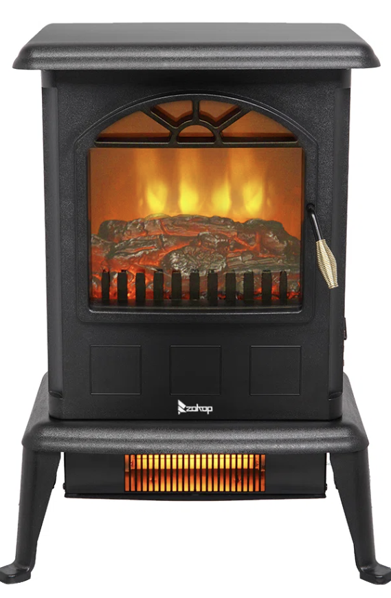 Compact electric fireplace space heater with faux flame display, creating a warm, cabin-style cozy glow in a small living space.
