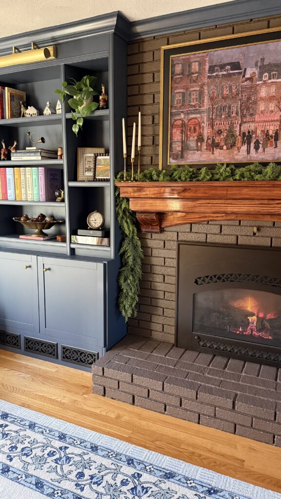 Cozy fireplace with bookshelves and decor